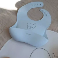 Bamboom Bavaglino in Silicone con Tasca Portaoggetti